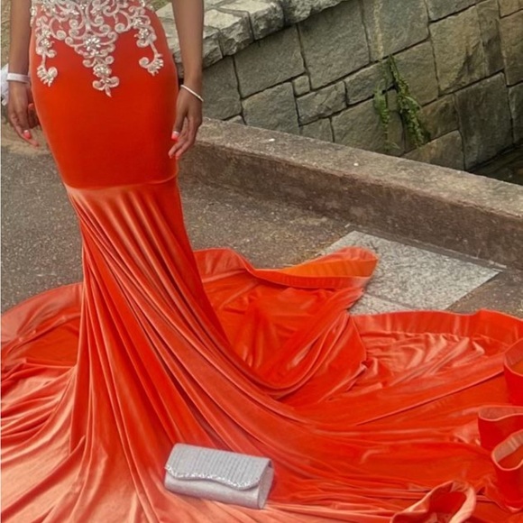 Velvet Orange Dress.,Stretchy Material. Can fit up to a Size 2 . Dry Clean done. - Picture 6 of 6